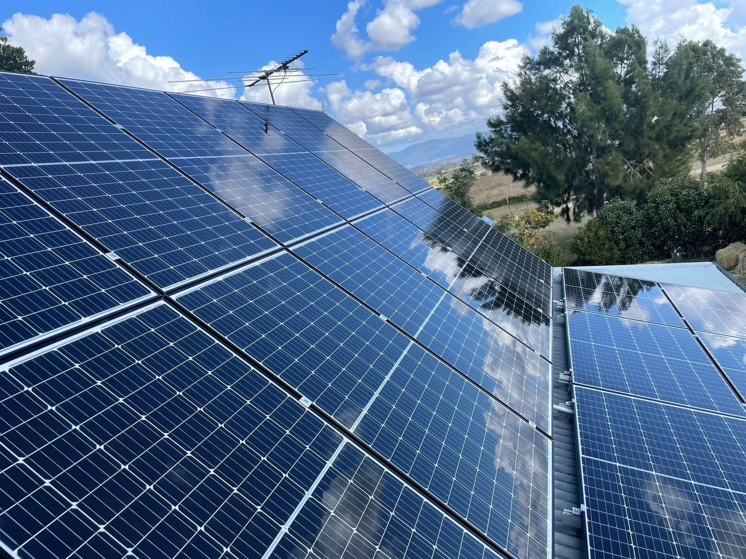 A residential solar array photographed from the roof after a professional panel clean in Ipswich